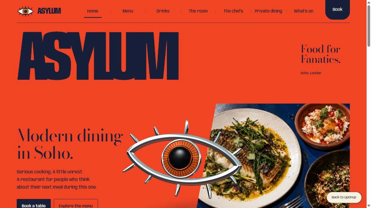 Asylum restaurant website with orange identity, sculptural eye and food imagery